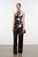 Silk halter top with black base and multicolor circular print, keyhole neckline
