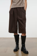 Dark brown wide-leg shorts with gathered elastic waist and side pockets