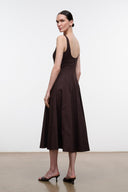 Dark brown sleeveless midi dress with sleeveless straps and flared, pleated skirt