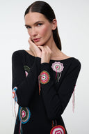 Black long-sleeve dress with colorful dreamcatcher embroidery, round neckline
