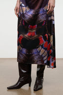 Knee-high snake-embossed heeled boot in dark espresso brown, smooth pointed toe.