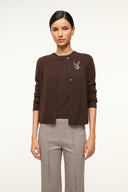Dark chocolate cashmere cardigan with button front and small butterfly emblem