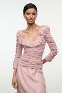 Sandrose pale pink ruched top with wide ruffle neckline and long gathered sleeves