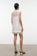Ivory back view mini dress with sleeveless design and feather fringe hem