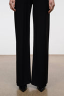 Black snake-print ankle boots with pointed toe and low heel