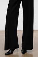 Black snake-print ankle boots, side profile with pointed toe