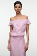 Dusty pink off-shoulder maxi dress with draped neckline and fitted waist