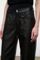 Black leather pants with high-rise waistband, button closure, and front pockets