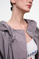 Zinc gray hooded jacket detail with snap front and elastic cuff tabs