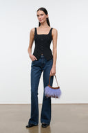 Black sleeveless tank top with square neckline and small front buttons