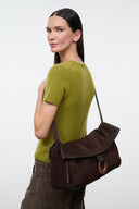 Espresso brown suede messenger bag with curved flap and wide shoulder strap.