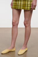 Butter yellow slip-on flats with gathered vamp detail
