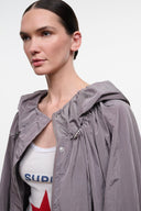 Zinc gray hooded jacket close-up with snap front and adjustable hood