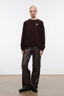 Dark chocolate cashmere sweater with embroidered dog logo, long sleeves, loose hem