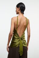 Olive green silk halter top with open back and tied center-knot detail