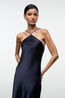 Navy satin halter maxi dress with beaded halter neckline and fitted bodice