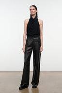 Black leather pants with high rise, belt loops, and wide straight-leg silhouette
