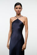 Navy halter maxi dress with V-neckline and draped satin sheen