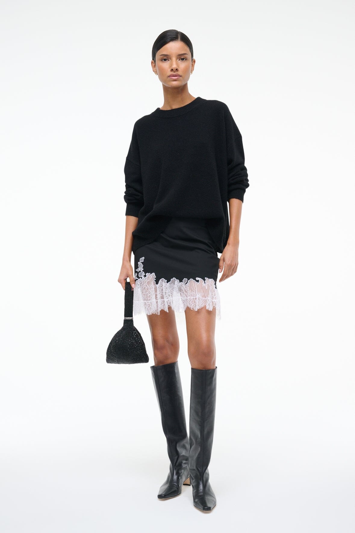Image NADIA MINI SKIRT | BLACK 1 of 7 and Clicking this image will trigger a zoom pop-up