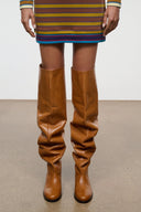 Cashew brown over-the-knee boots with ruched shaft and black block heel