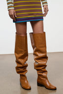 Cashew brown over-the-knee boots, smooth toe and ruched shaft with black heel