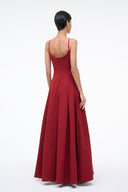 Low-back sleeveless maxi dress with full A-line skirt, deep red