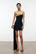 Strapless black mini dress with olive-gold curved neckline panel