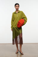 Oversized tangerine-orange suede bag with flap and gathers along the side.