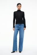 Black button-front turtleneck sweater with long sleeves