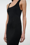 Black sleeveless dress with scoop neckline and thin straps, stitched seam detail