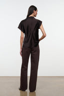 High-rise dark brown jeans, back view with yoke and back pockets