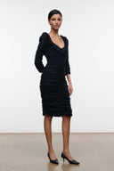Black ruched V-neck midi dress with long sleeves and fitted silhouette.