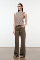 Relaxed dark olive jeans with button fly, relaxed straight legs and front pockets