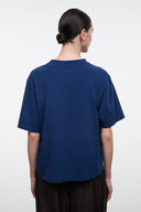 Blue relaxed tee, back view, short sleeves; no front graphic