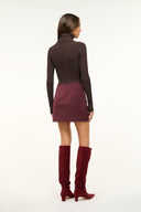 Maroon mini skirt, back view with waistband and center seam