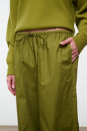 Mateo pants in pear green with elastic drawstring waist, side pockets, wide legs