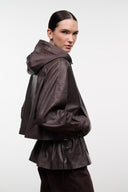 Dark brown hooded leather jacket with adjustable cords, ruched waist and zip front