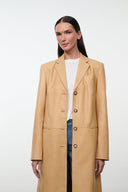 Tan leather long coat with notched lapels and button-front detail, front view.
