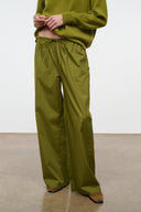 Mateo pants in pear green, relaxed wide-leg cut with elastic waistband and pockets