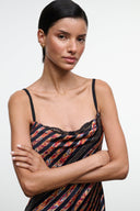 EVANGELINE silk midi dress with spaghetti straps and lace-trim cowl neckline.
