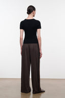 Dark oak wide-leg pants with relaxed fit and elastic waistband, back view