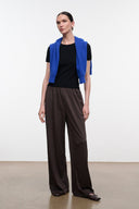 Dark oak wide-leg pants with elastic waistband and relaxed straight legs