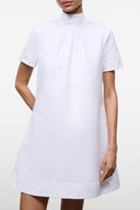 White mini dress with short sleeves and high gathered neckline