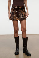 Crest haircalf mini skirt in fawn brown with dark speckles and center seam