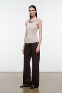 Front view of women's champagne sleeveless cowl-neck fitted top with thin straps
