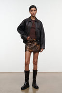 Crest haircalf mini skirt with fawn brown base and dark speckled finish
