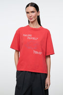 Relaxed red T-shirt with graphic text 'FEELING PRICKLY' and 'TODAY' on front