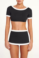 Black swim skirt with white trim and layered sporty hem