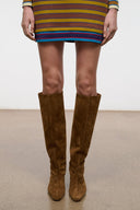 Tall brown suede boots with pointed toe and stacked heel