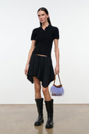 Black mini skirt with draped panels and jagged frayed hem
